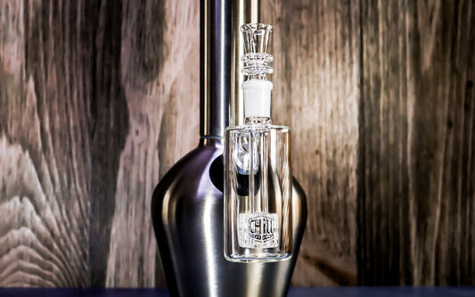 Glass water pipe with sleek metallic base