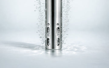 Metal tube creating bubbles in water