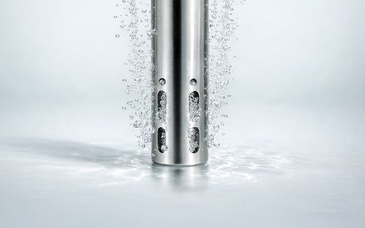 Metal tube creating bubbles in water