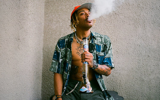 Smoker with bong and smoke exhalation