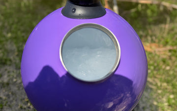 Purple beverage holder with ice inside
