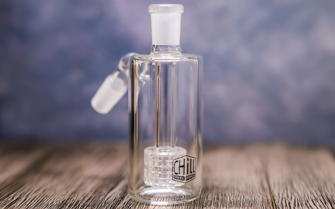 Glass ash catcher from Chill Steel Pipes on wooden table