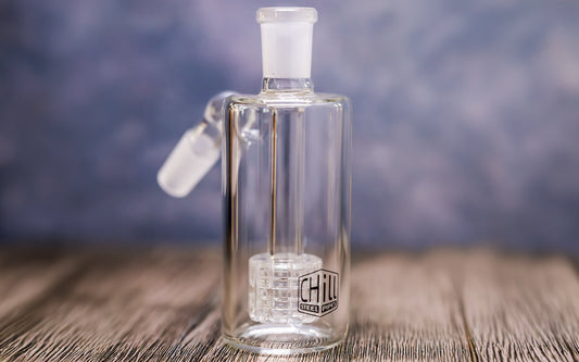 Glass ash catcher from Chill Steel Pipes on wooden table